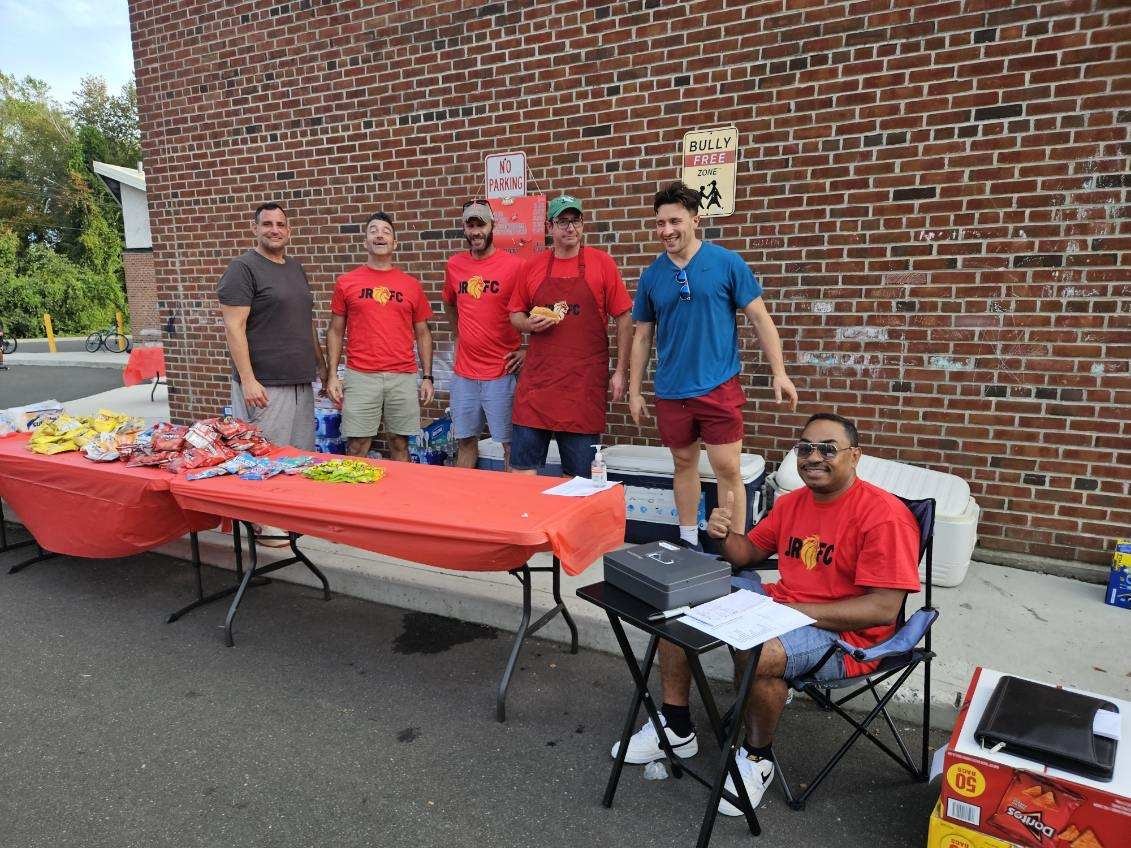 Fathers Club members volunteering at a school event